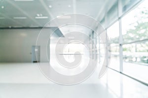 abstract blur and defocused in empty office building with glass