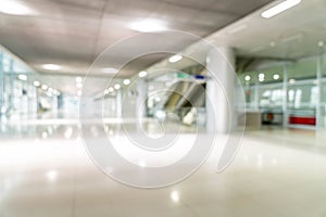 abstract blur and defocused in empty office building with glass