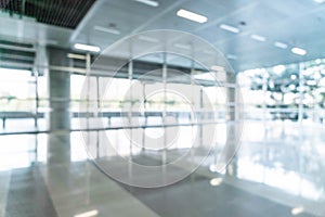 abstract blur and defocused in empty office building with glass