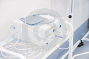 Abstract blur of hospital and clinic interior. Modern equipment in operating room. Medical devices for neurosurgery