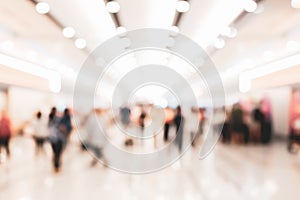 Abstract blur people in exhibition hall event background, defocused tradeshow event exhibition, business convention show, job fair photo