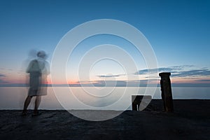 Abstract Blur silhouette of man fishing rod