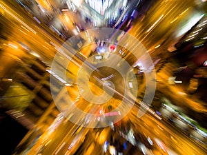 Abstract blurred aerial view to crossroads with car lights and zoom effect