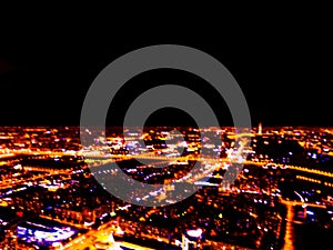 Abstract Blurred background Aerial night view of a big city. Cityscape panorama bokeh at night. Blurry Aerial view of skyscraper a