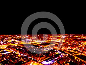 Abstract Blurred background Aerial night view of a big city. Cityscape panorama bokeh at night. Blurry Aerial view of skyscraper a