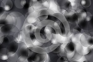 Abstract blurred background bokeh black and white from a variety of transparent circles, bubbles