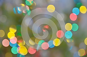 Abstract blurred background of colored lights of Christmas garland