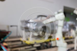 Abstract blurred background interior of car production factory b