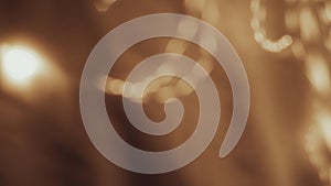 Abstract blurred background with warm tones and circular light patterns