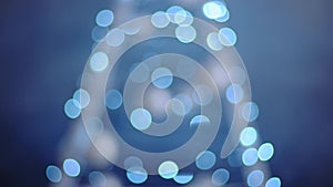 Abstract blurred blue bokeh background of garland