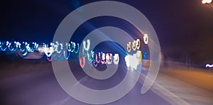 Abstract blurred of blue and silver glittering shine bulbs lights background