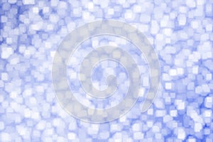 Abstract blurred blue square bokeh background .