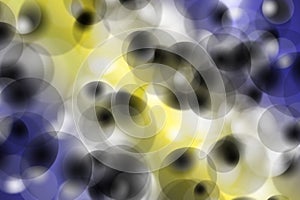 Abstract blurred blue-and-yellow background-the bokeh of the plurality of transparent circles, bubbles photo