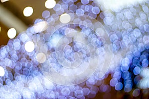 Abstract blurred and bokeh of led blue lighting refection in Christmas holiday background