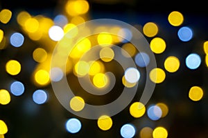 Abstract blurred and bokeh of party light bubs with star LED reflection lighting at night time