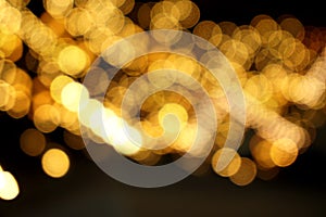 Abstract blurred and bokeh of reflection lighting of light bubs on black background