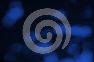 Abstract blurred bokhe on dark blue background