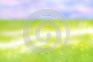 Abstract blurred bright spring or summer landscape texture with natural light green white bokeh lights and blue bright sunny sky