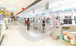 Abstract blurred checkout desk in supermarket for background, row of cashier counter with customer inside marketplace photo