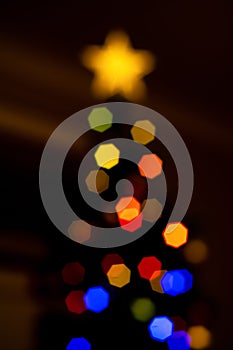 Abstract blurred disfocused Christmas lights and tree background