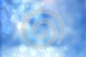 Abstract blurred festive winter christmas or Happy New Year background with shiny blue and white bokeh lighted snow landscape with