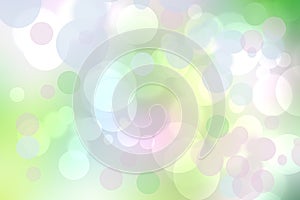 Abstract blurred fresh vivid spring summer light delicate pastel yellow green white bokeh background texture with bright circular