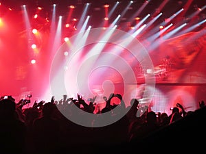 Abstract blurred image. Crowd during a entertainment public concert a musical performance. Hand fans in fun zone people