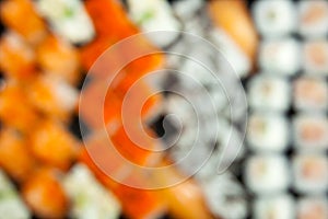 Abstract blurred. out of focus.defocused. Close up fresh juicy delicious sushi set. top view.