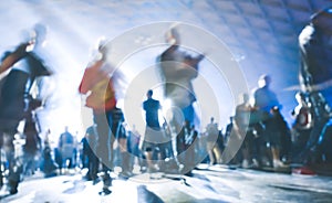 Abstract blurred people dancing at music party night festival concert event