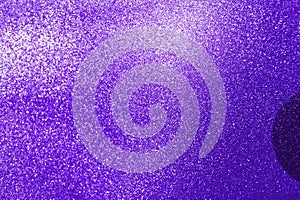 Abstract blurred purple glitter texture background