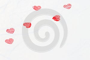Abstract blurred of red heart on white mulberry paper texture.