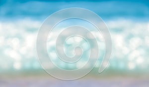 Abstract blurred shining sunlight bokeh on blue sea horizontal background