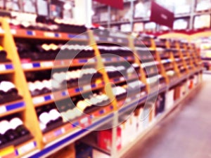 Abstract blurred supermarket store and refrigerators in department store. Interior shopping mall defocused background. Business fo