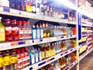 Abstract blurred supermarket store and refrigerators in department store. Interior shopping mall defocused background. Business fo