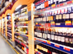 Abstract blurred supermarket store and refrigerators in department store. Interior shopping mall defocused background. Business fo