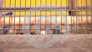 Abstract blurred video of empty trolley in supermarket bokeh background. Empty shopping cart in supermarket