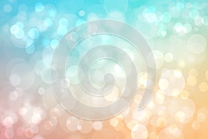 Abstract blurred vivid spring summer light delicate pastel blue orange bokeh background texture with bright soft color circles and