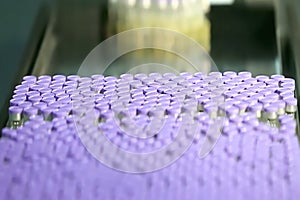 Abstract, blurry, bokeh background, image for the background. PET plastic bottle in conveyor for medicine or dietary supplement pa