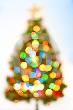 Abstract bokeh Christmas tree background. photo