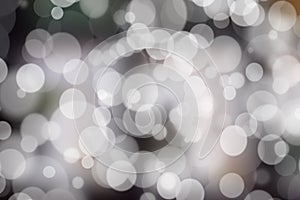 Abstract bokeh festive background with defocused lights