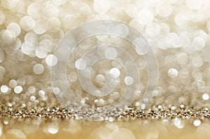 Abstract bokeh golden and yellow colors defocused circular background. Christmas light, new year or season .greeting background