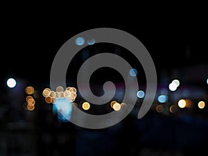 Abstract bokeh nightlife in city background