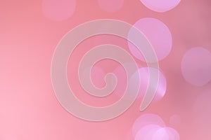 Abstract bokeh on pink gold background