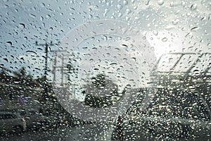 Abstract bokeh from raindrops on glass after rain