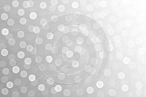 Abstract Bokeh and Shining Light Rays in Grey Gradient Background