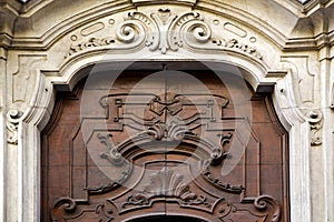 abstract brass in a closed wood door lugano Switzerland