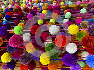 Abstract bright background.Vivid different colors balls of threads.