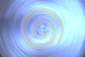 Abstract bright blue spin