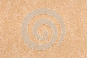 Abstract brown background or brown paper parchment with soft texture or tan cream colored.