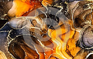 Abstract brown bright shiny color fluid background, hand drawn alcohol painting with golden streaks, liquid ink technique texture